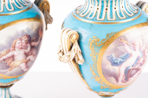 Lot 572 - A pair of Sevres bleu celeste style porcelain...
