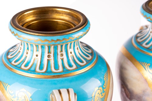 Lot 572 - A pair of Sevres bleu celeste style porcelain...