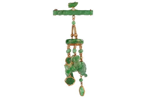 Lot 116A - A jadeite bar brooch with tassel, in the form...