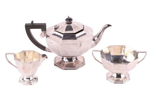 Lot 368 - A late George V silver three piece tea set,...