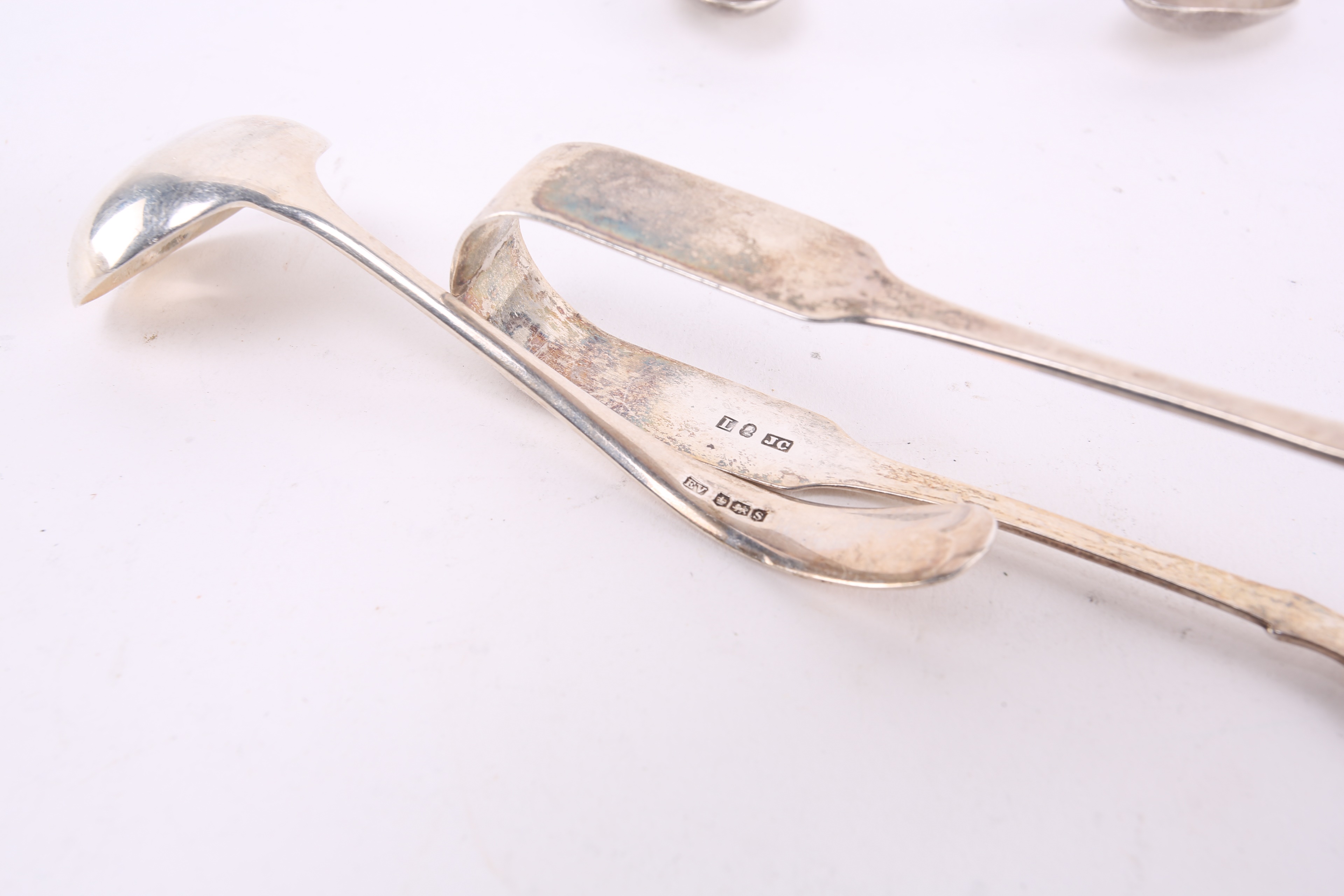Lot 385 A set of six silver soup spoons, Gladwin Ltd,
