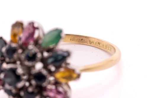 Lot 212 - A gem-set flower dome ring, centred with a...