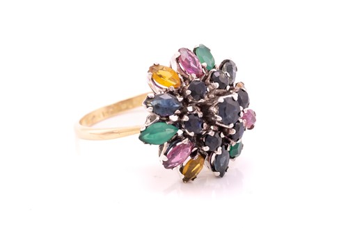 Lot 212 - A gem-set flower dome ring, centred with a...