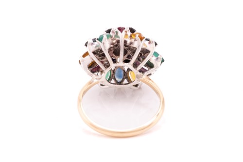 Lot 212 - A gem-set flower dome ring, centred with a...