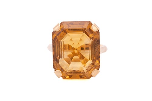 Lot 48 - A citrine brooch, matching earrings and a ring...