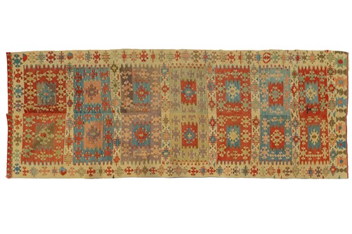 Lot 114 - An old Turkish Kilim with a central ground...