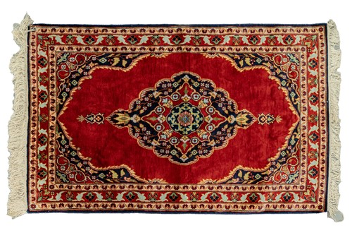 Lot 115 - A small Turkish silk on silk mat with a...