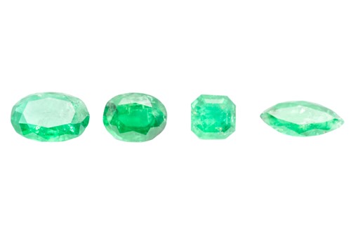 Lot 254 - Four loose faceted emeralds weighing 2.32ct in...