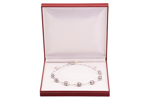 Lot 144 - A Tahitian pearl necklace, composed of seven...