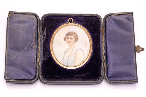 Lot 348 - An early 20th Portrait miniature of a young...