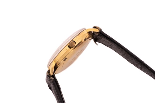 Lot 402 - An 18ct gold Omega Genève wristwatch,...