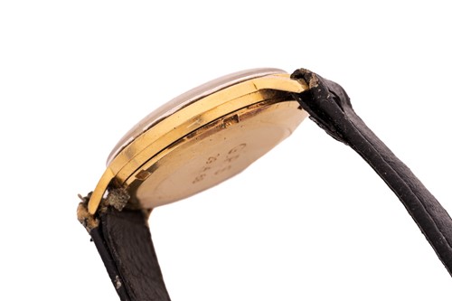 Lot 402 - An 18ct gold Omega Genève wristwatch,...