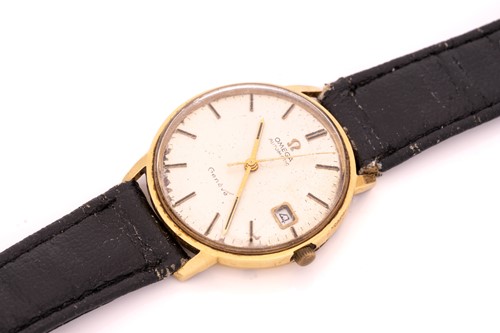 Lot 402 - An 18ct gold Omega Genève wristwatch,...
