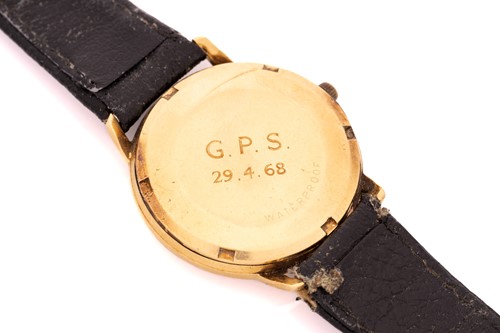 Lot 402 - An 18ct gold Omega Genève wristwatch,...