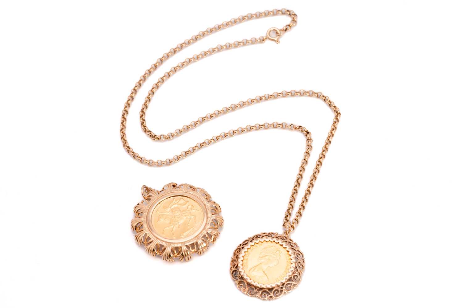Lot 6 - An Isle of Man sovereign in pendant mount, and...