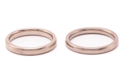 Lot 263 - Two wedding bands in 18ct white gold; the...