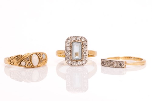 Lot 331 - Three gem-set rings in 18ct gold; including an...