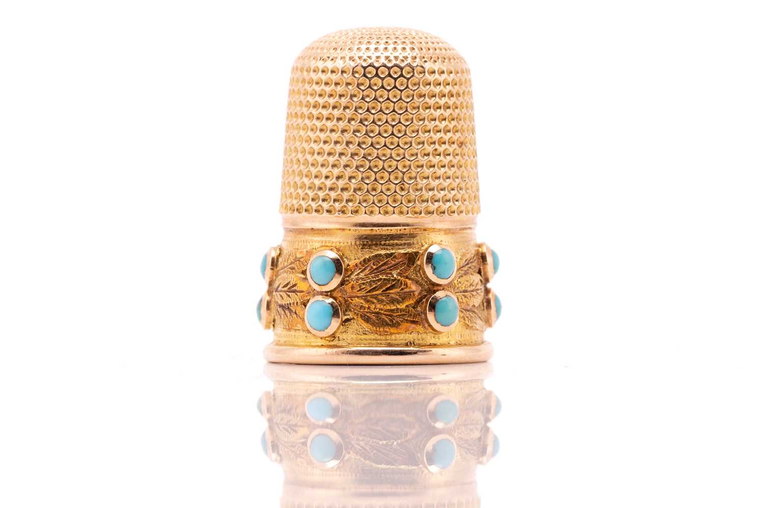 Lot 74 - A gem-set thimble, the upper half comprises a...
