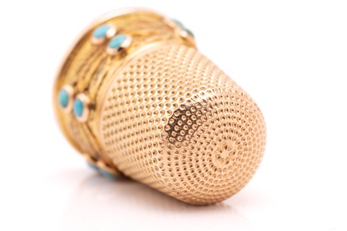 Lot 74 - A gem-set thimble, the upper half comprises a...