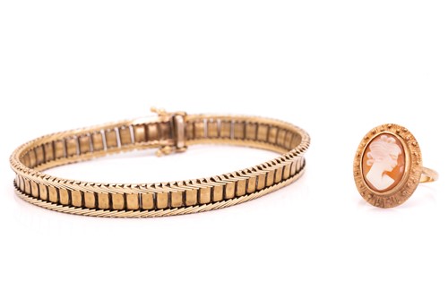 Lot 273 - A 9 carat gold bracelet; of textured...