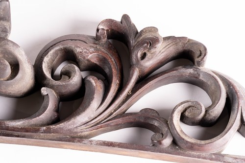 Lot 101 - A 19th-century mahogany door mantle with a...