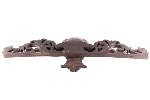 Lot 101 - A 19th-century mahogany door mantle with a...