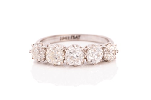 Lot 309 - A five-stone diamond half-hoop ring,...