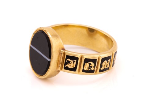 Lot 247 - A Victorian mourning ring, set with an oval...