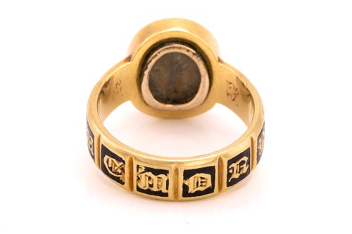 Lot 247 - A Victorian mourning ring, set with an oval...