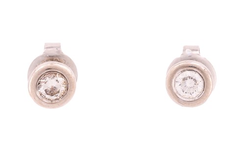 Lot 116 - A pair of diamond stud earrings, each...