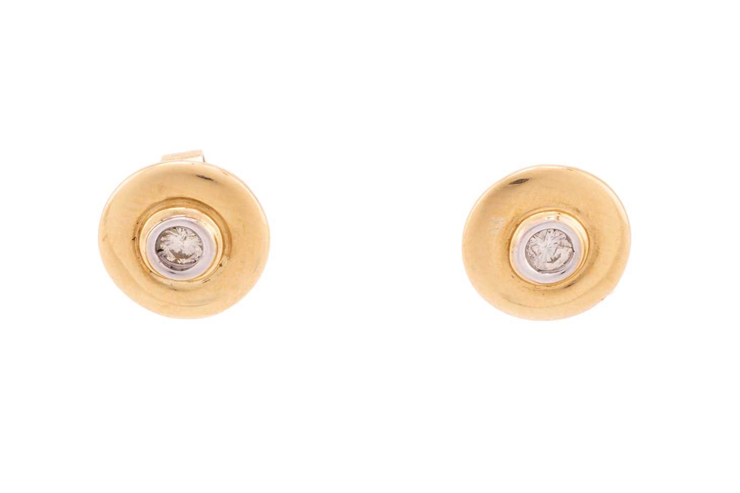 Lot 50 - A pair of diamond stud earrings, each...