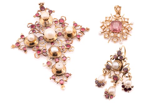 Lot 143 - A 19th century yellow metal, garnet, and pearl...