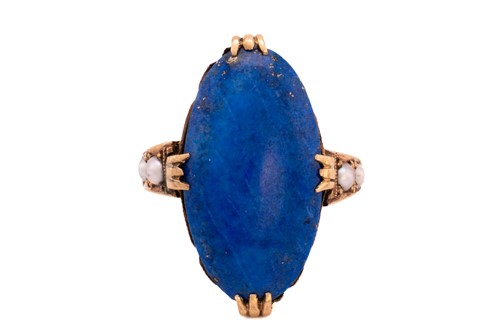 Lot 144 - A lapis lazuli and pearl cocktail ring,...