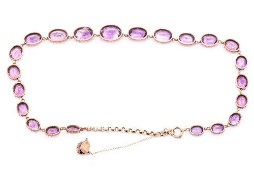 Lot 152 - An amethyst rivière necklace, composed of...