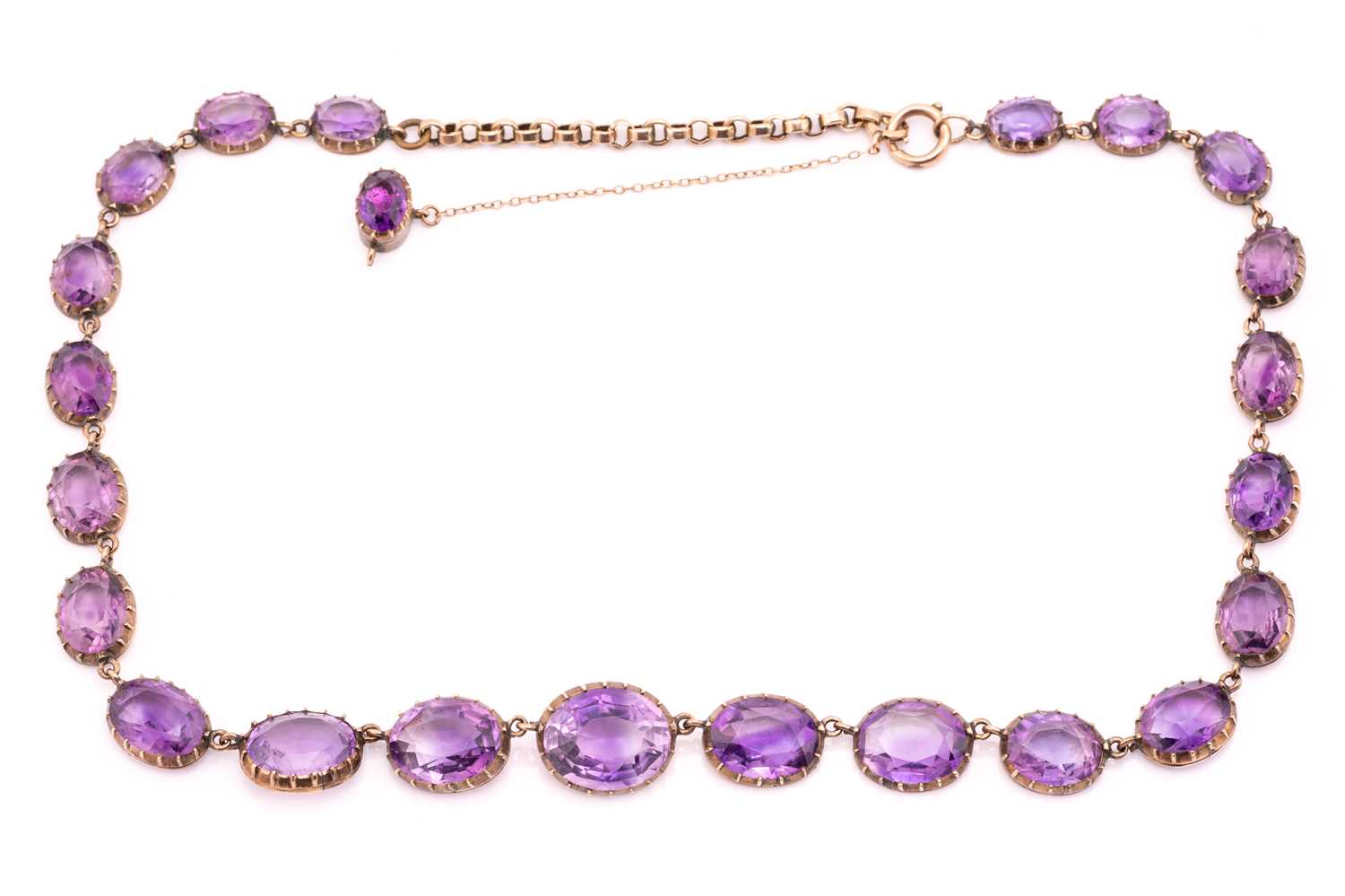 Lot 152 - An amethyst rivière necklace, composed of...