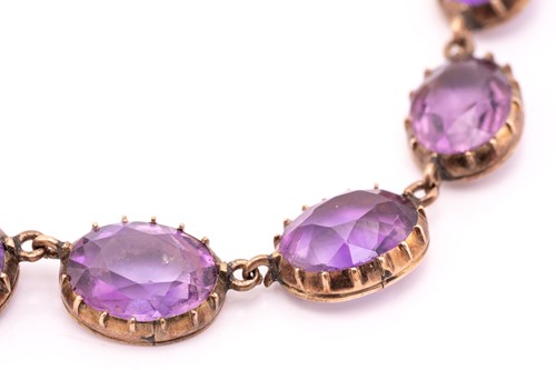 Lot 152 - An amethyst rivière necklace, composed of...