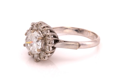 Lot 359 - A diamond cluster ring, formed from a central...