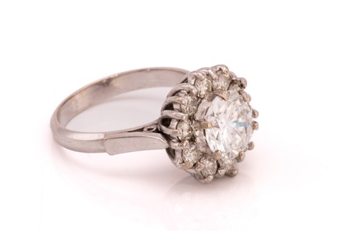 Lot 359 - A diamond cluster ring, formed from a central...