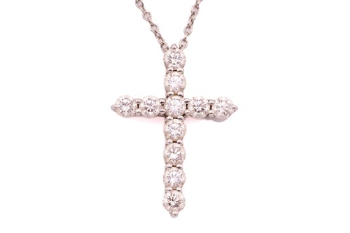 Lot 118 - Tiffany & Co. - a diamond cross pendant on...