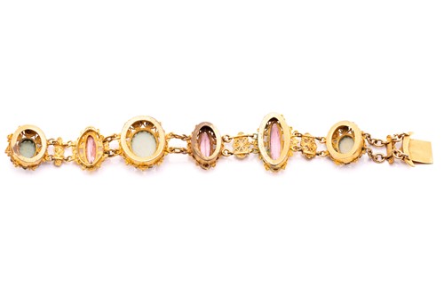 Lot 16 - A 19th-century bracelet set with pink paste...