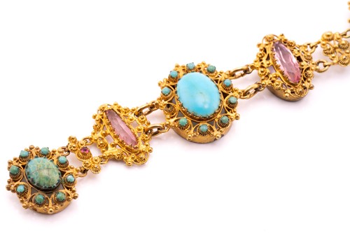 Lot 16 - A 19th-century bracelet set with pink paste...