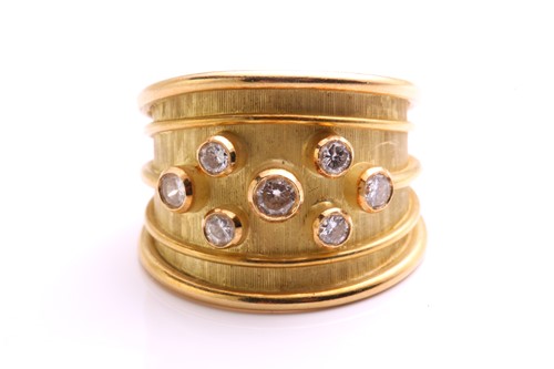 Lot 225 - De Vroomen - An 18ct yellow gold ring set with...