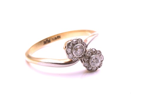 Lot 44 - A diamond Toi et Moi crossover ring,...