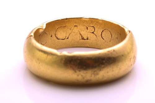 Lot 298 - An Early 18th-century wedding ring, the thick...