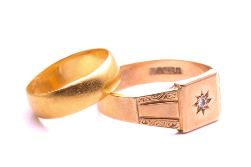 Lot 33 - A 22ct gold wedding band and a 9ct gold signet...