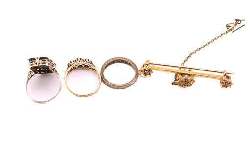 Lot 195 - Three gem-set rings and a horseshoe bar brooch;...