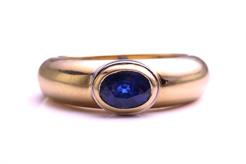 Lot 155 - Garrard & Co. - a sapphire solitaire ring in...