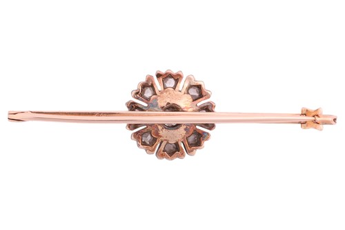 Lot 30 - A diamond-set flowerhead bar brooch, in the...