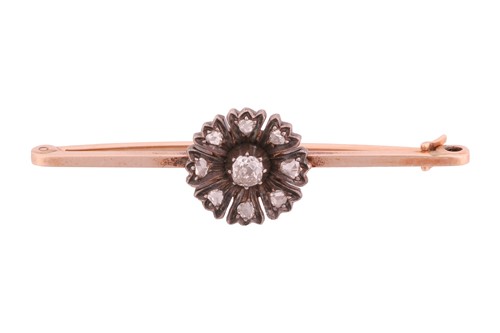 Lot 30 - A diamond-set flowerhead bar brooch, in the...