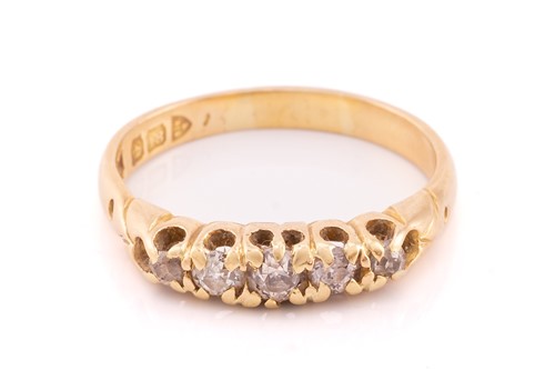 Lot 243 - An 18 carat gold five stone half hoop ring,...